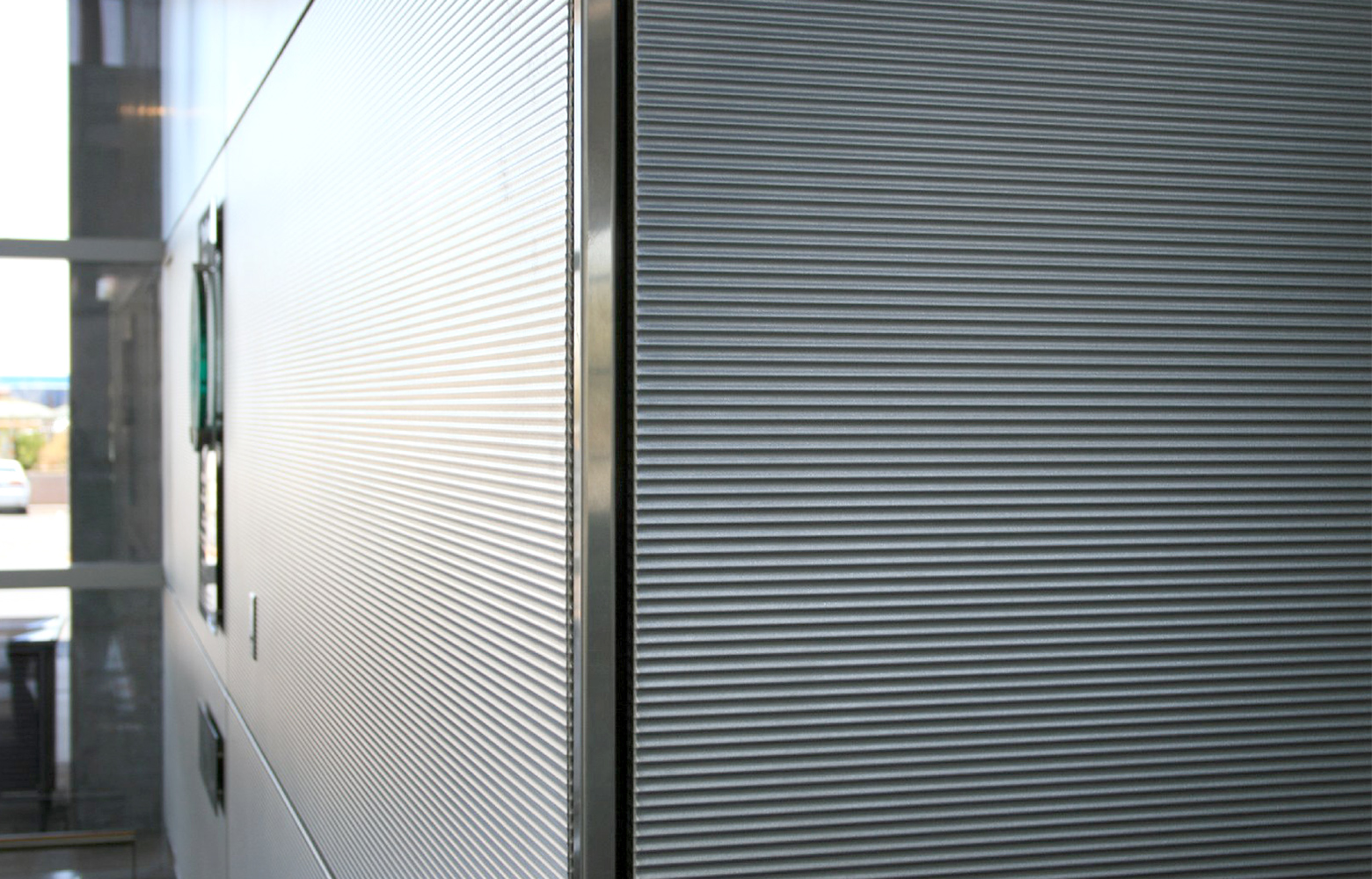 Inset-TxtrWall-PHX Phoenix Int'l Airport TXTRwall interior panel system, Rigidized Metals Architectural Solutions